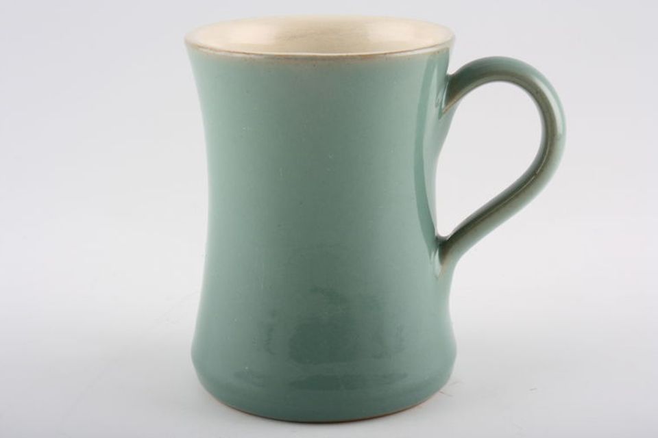 Denby Manor Green Mug waisted style- plain base. Colours may vary 3 1/4" x 4 1/4"