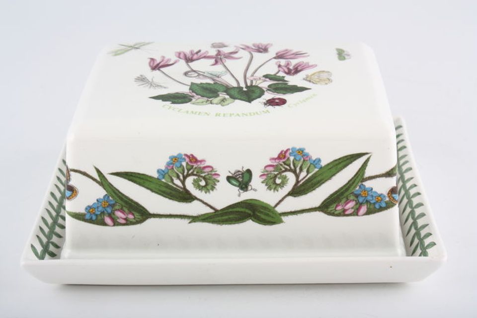 Portmeirion Botanic Garden - Older Backstamps Butter Dish + Lid Daisy base - Cyclamen and Forget me Not on lid. 6 1/4" x 5 1/4"